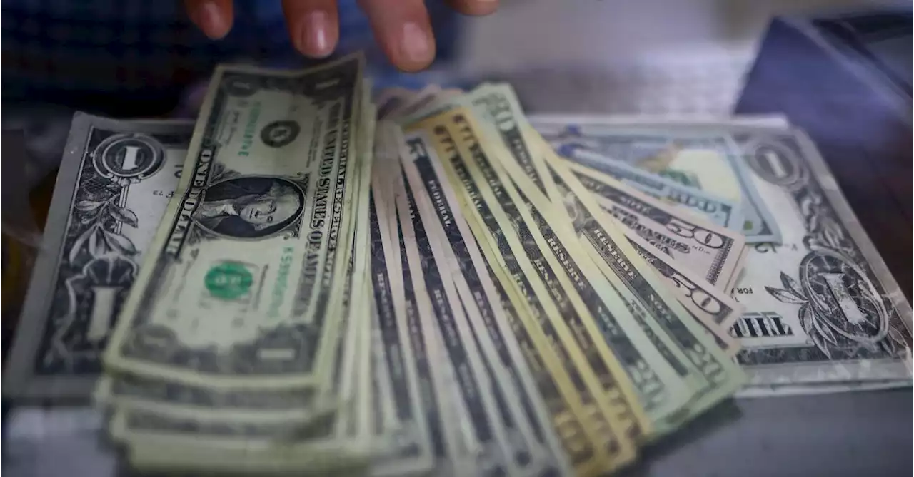Dollar eases as risk sentiment improves, China moves to support yuan