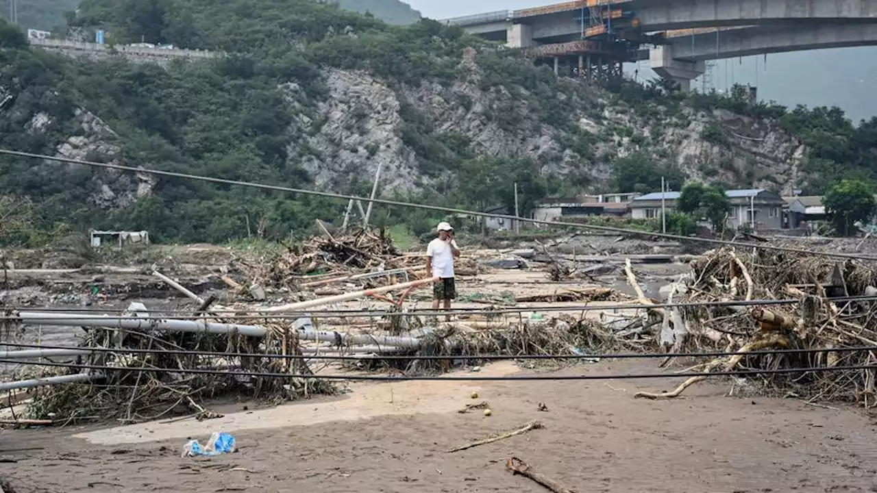 China confirms nearly three dozen people died in Beijing after record rains