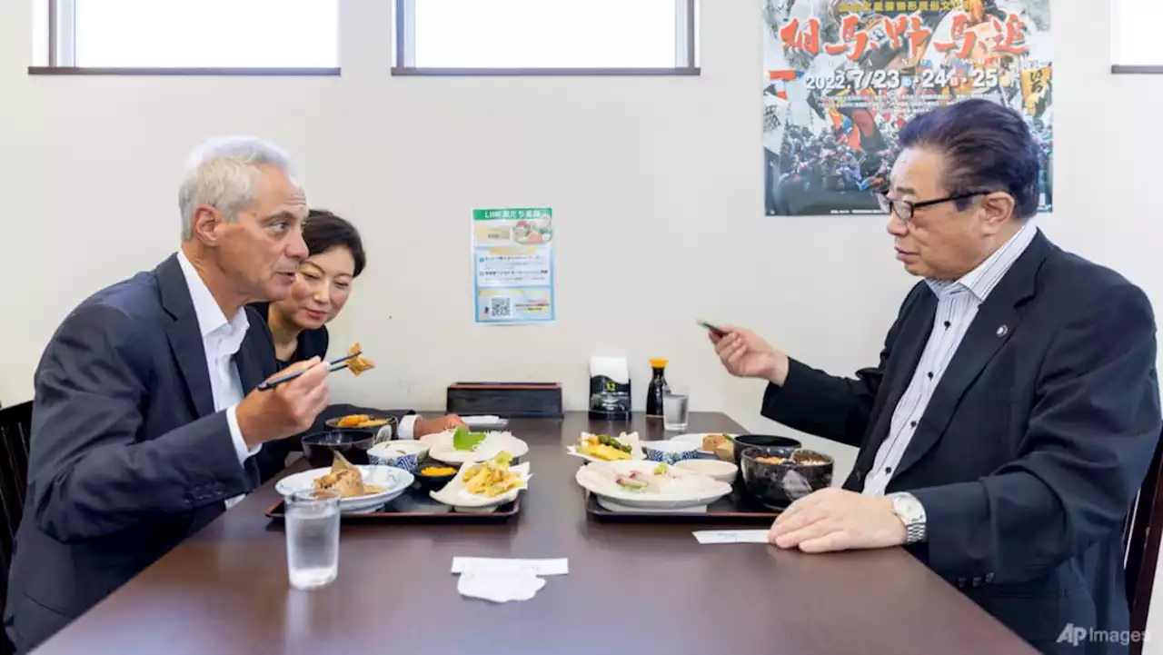 US envoy feasts on Fukushima fish, slams China water 'dumps'