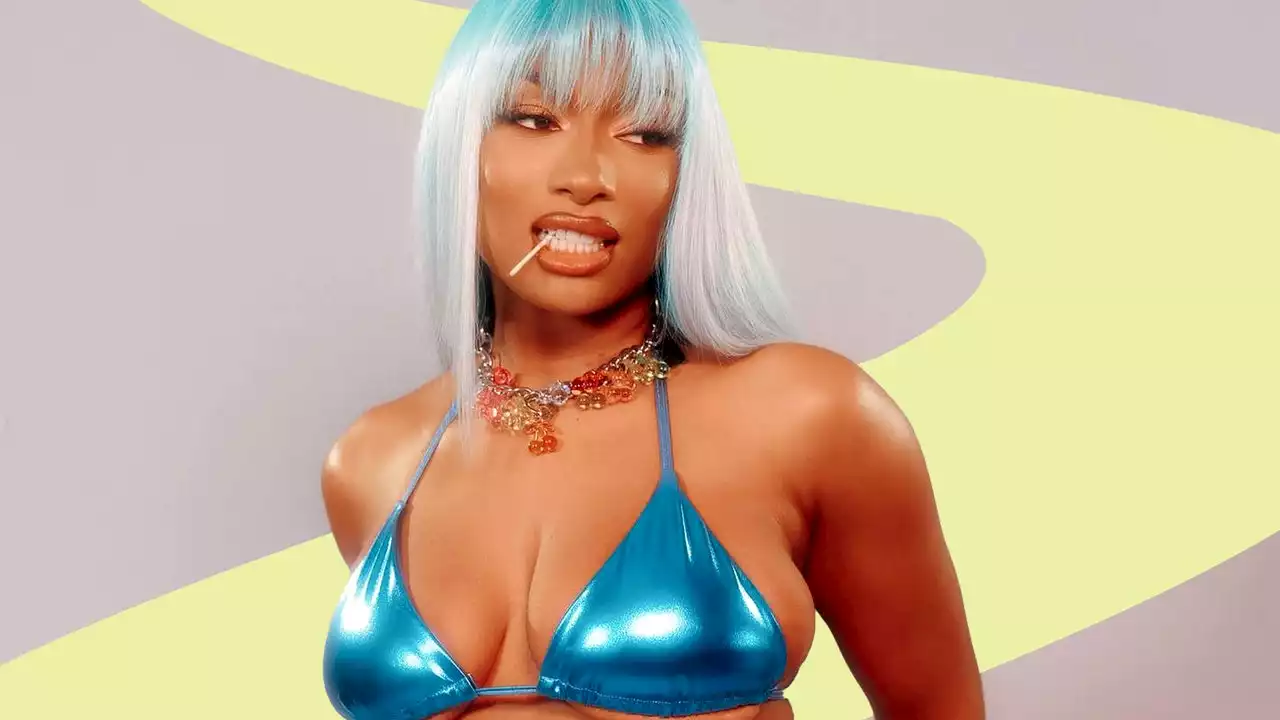 Megan Thee Stallion matched her manicure to her butterfly belly ring