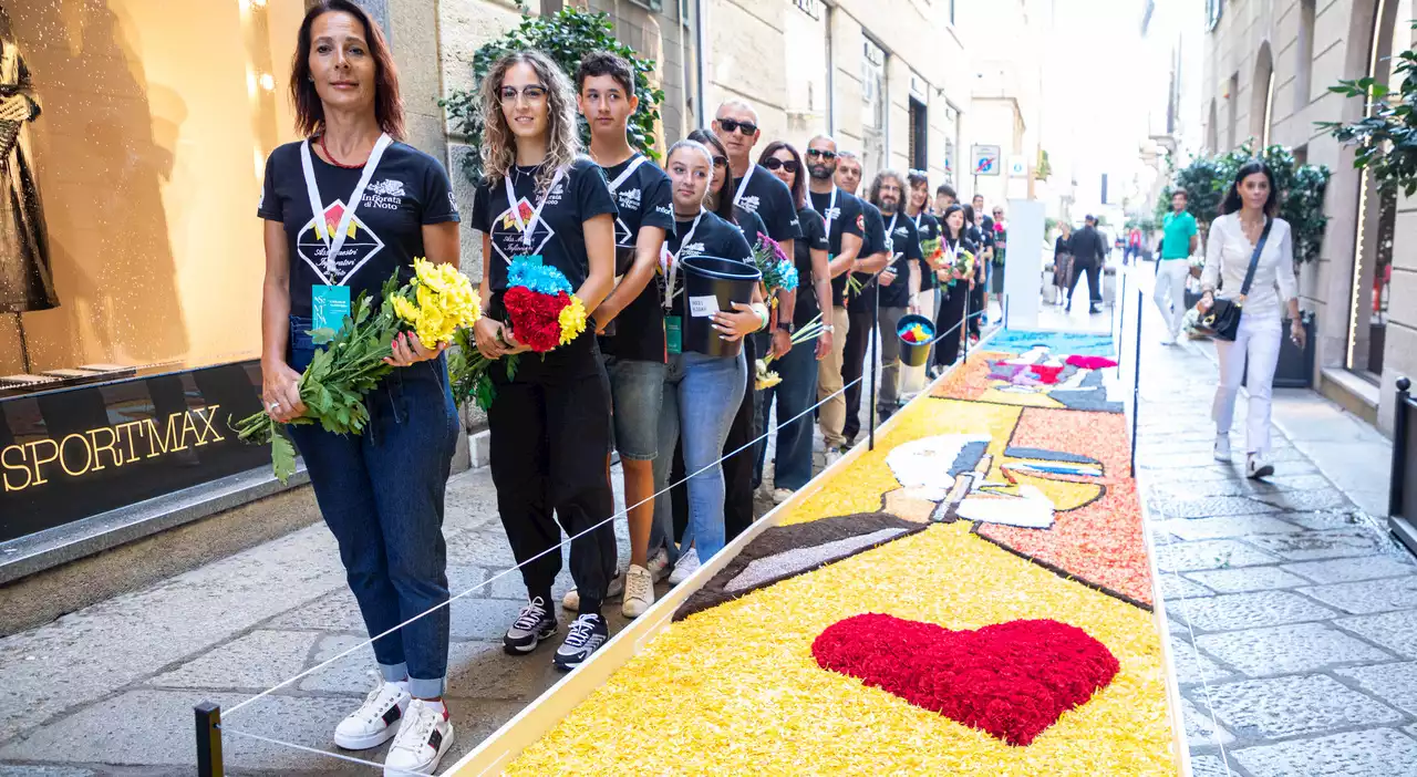 Milano, via Spiga a colori: lo spettacolo dei maestri infioratori di Noto e l'Intelligenza Artificiale