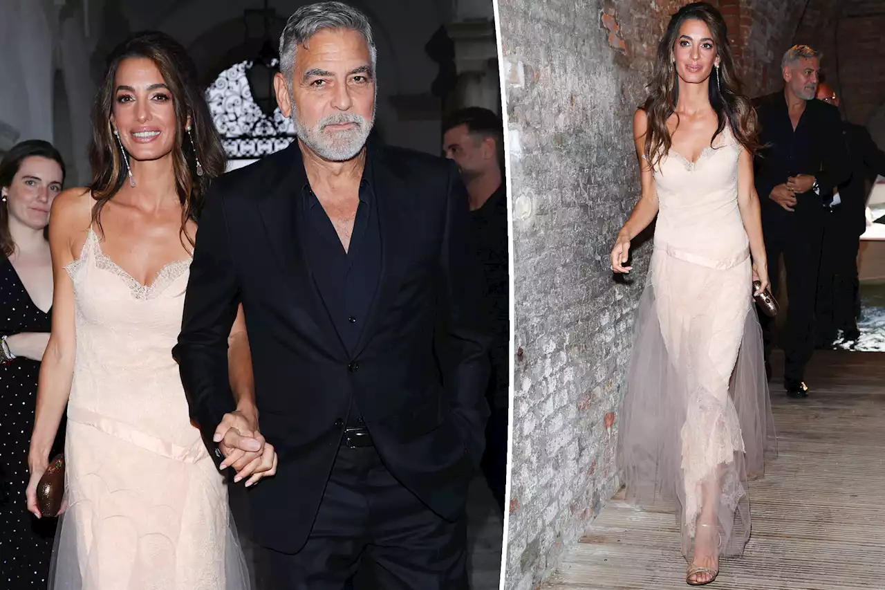 Amal Clooney is pretty in pink lace dress for romantic night out with George in Venice