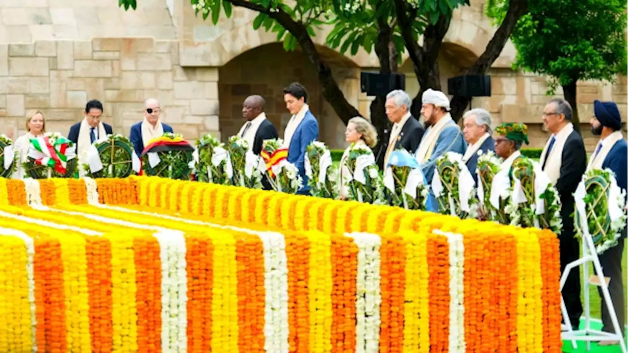 G20 leaders pay respects at Gandhi memorial as they wrap up Indian summit and hand over to Brazil