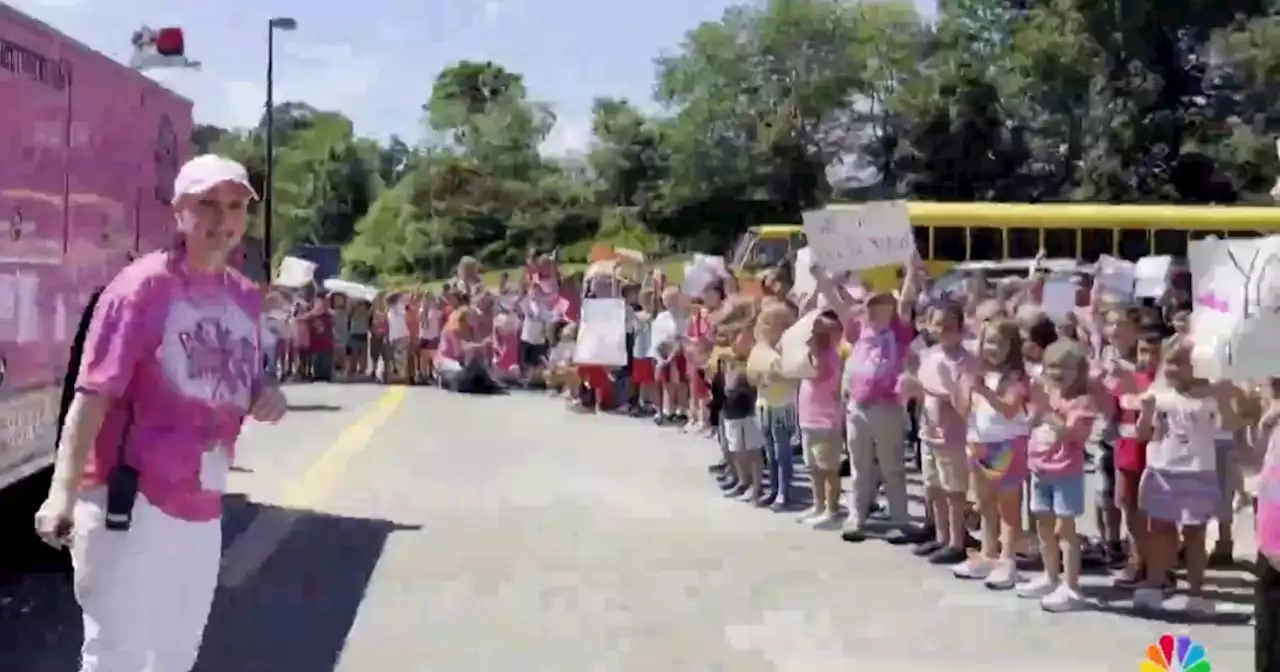 Elementary school students and staff surprise assistant principal battling cancer