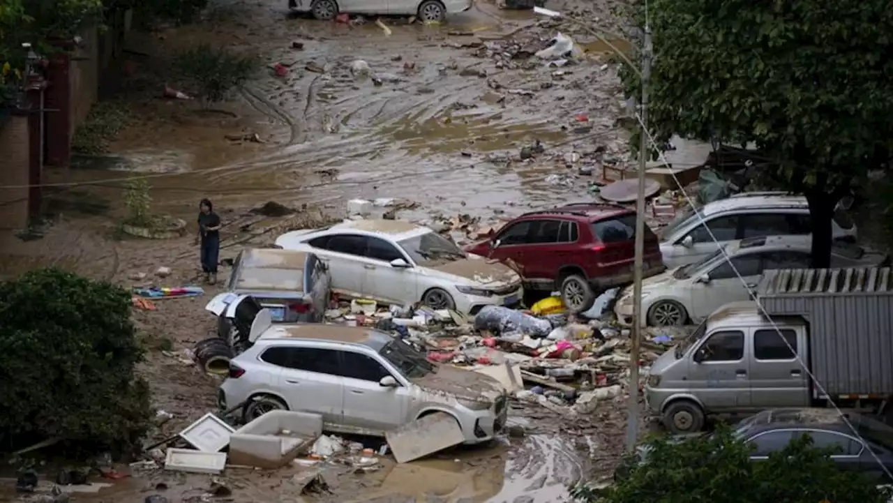 Rains from dying typhoon batter China for seventh day