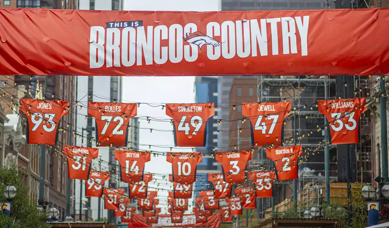 Photos: Fans Make Their Way to Mile High for a Cloudy Start to the Season