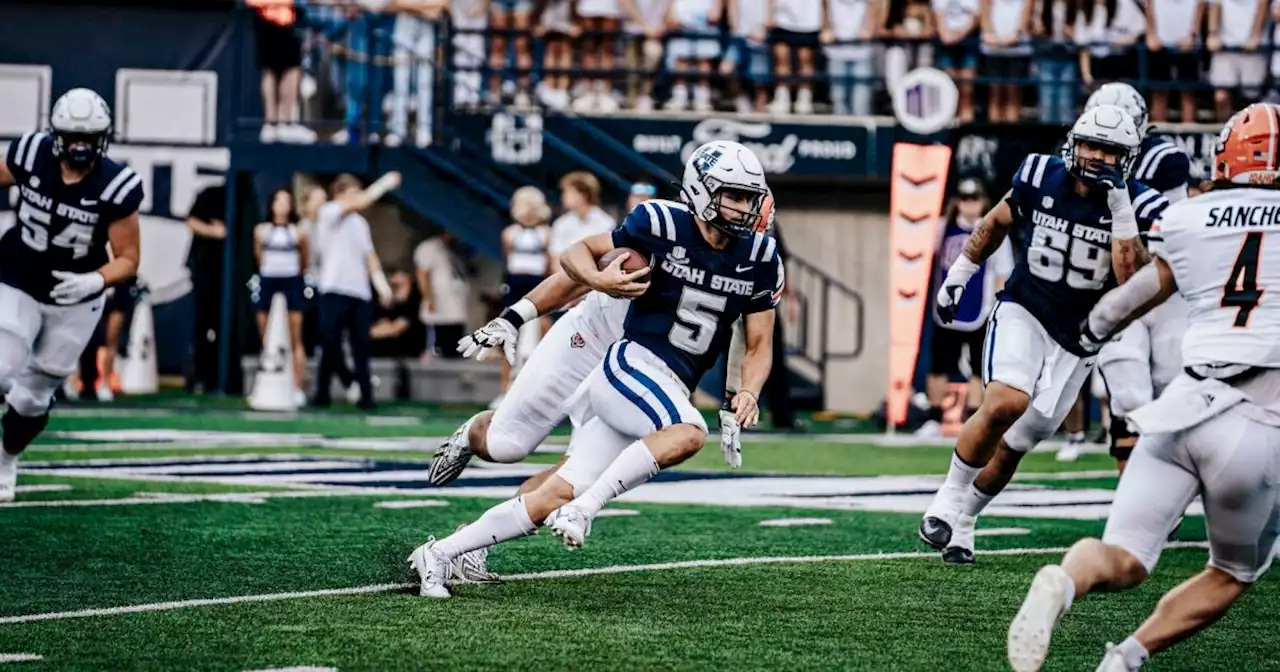 Legas, Williams each throw 2 TD passes to help power Utah State in 78-28 rout of Idaho State