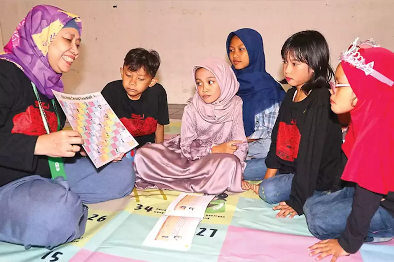 Ita Guntari, Ciptakan Ular Tangga Literasi Keuangan bagi Anak-Anak