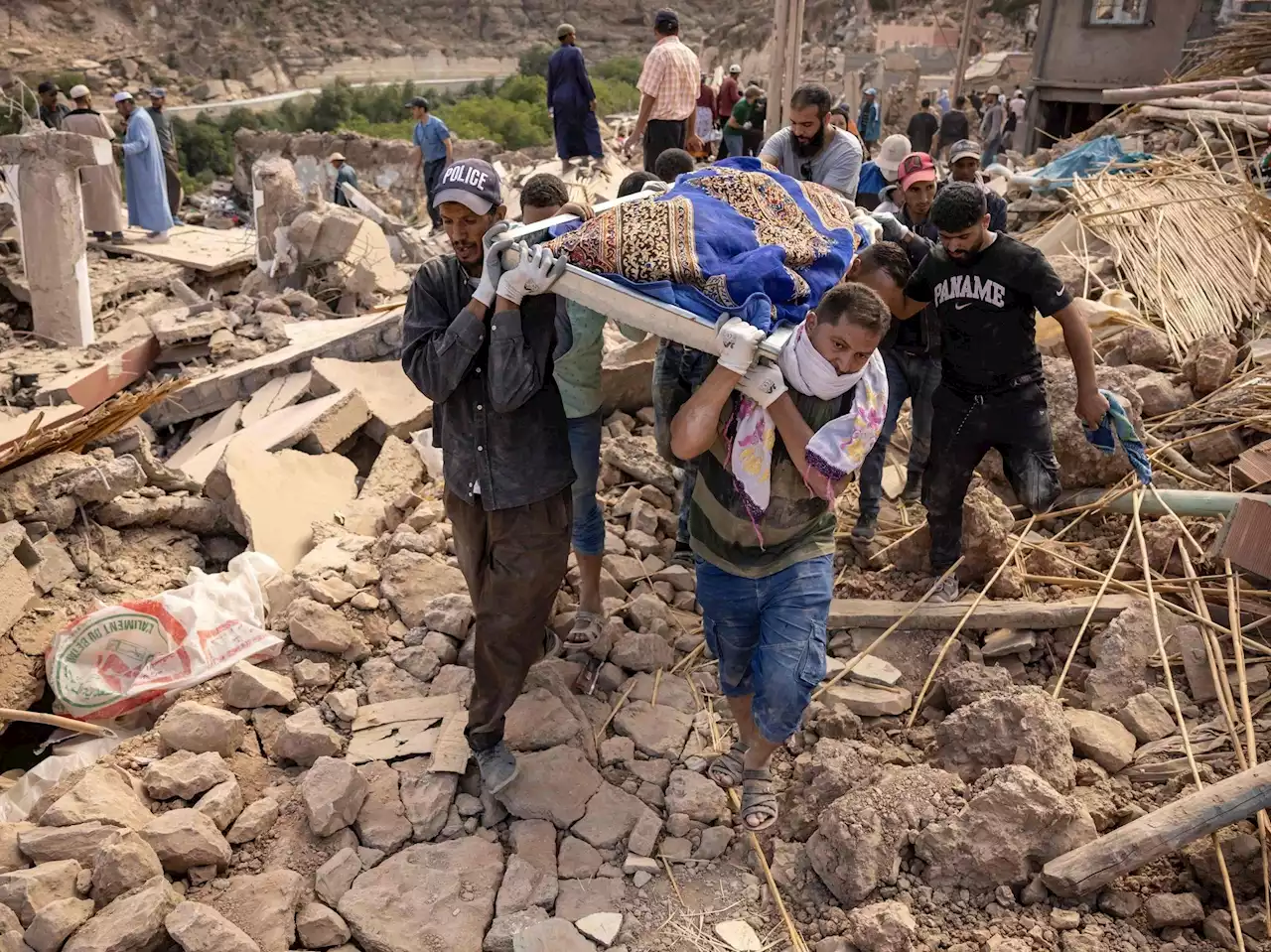 QUAKE AFTERMATH: Moroccans with shovels and bulldozers dig through rubble but hope for survivors dwindles