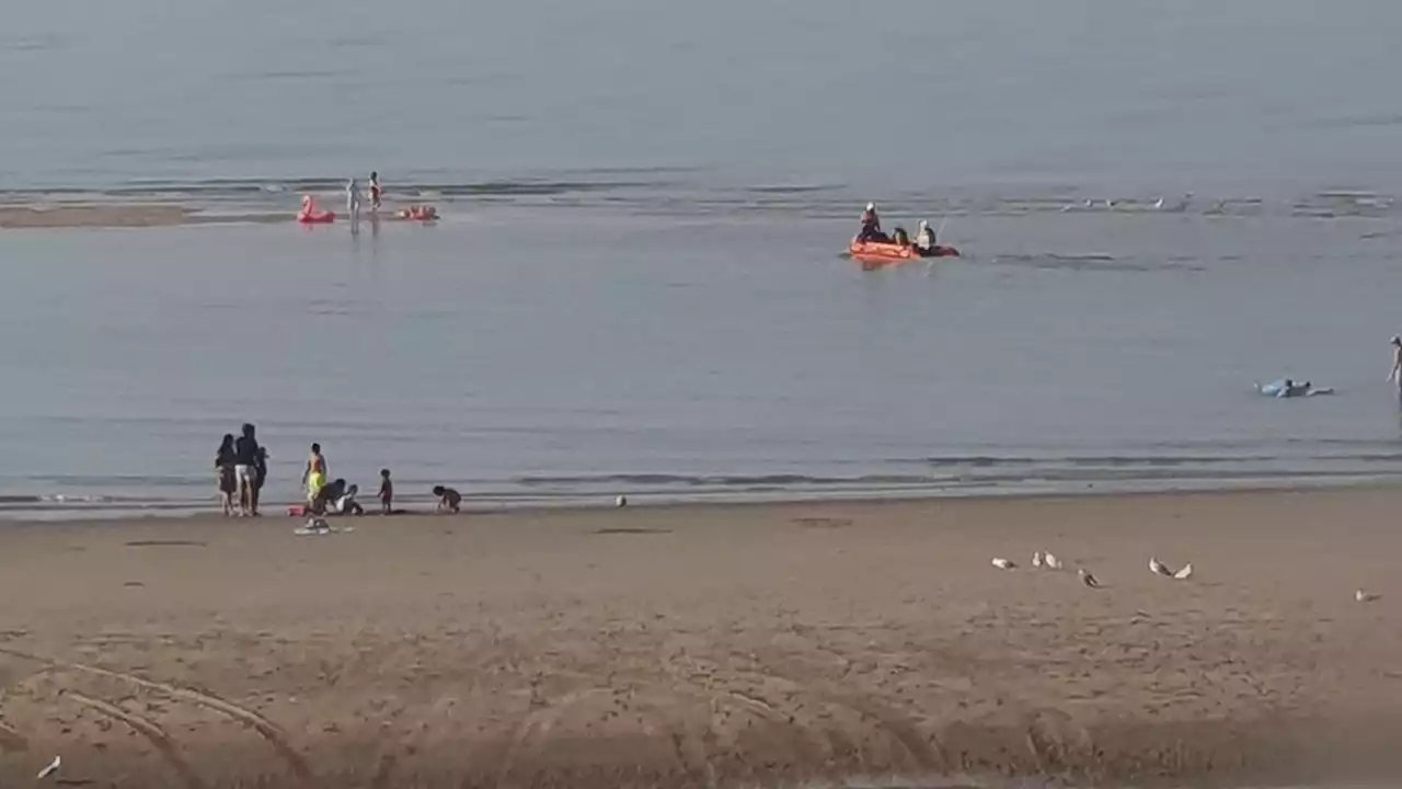 Over 100 people rescued after incoming tide leaves them stranded on Welsh beach