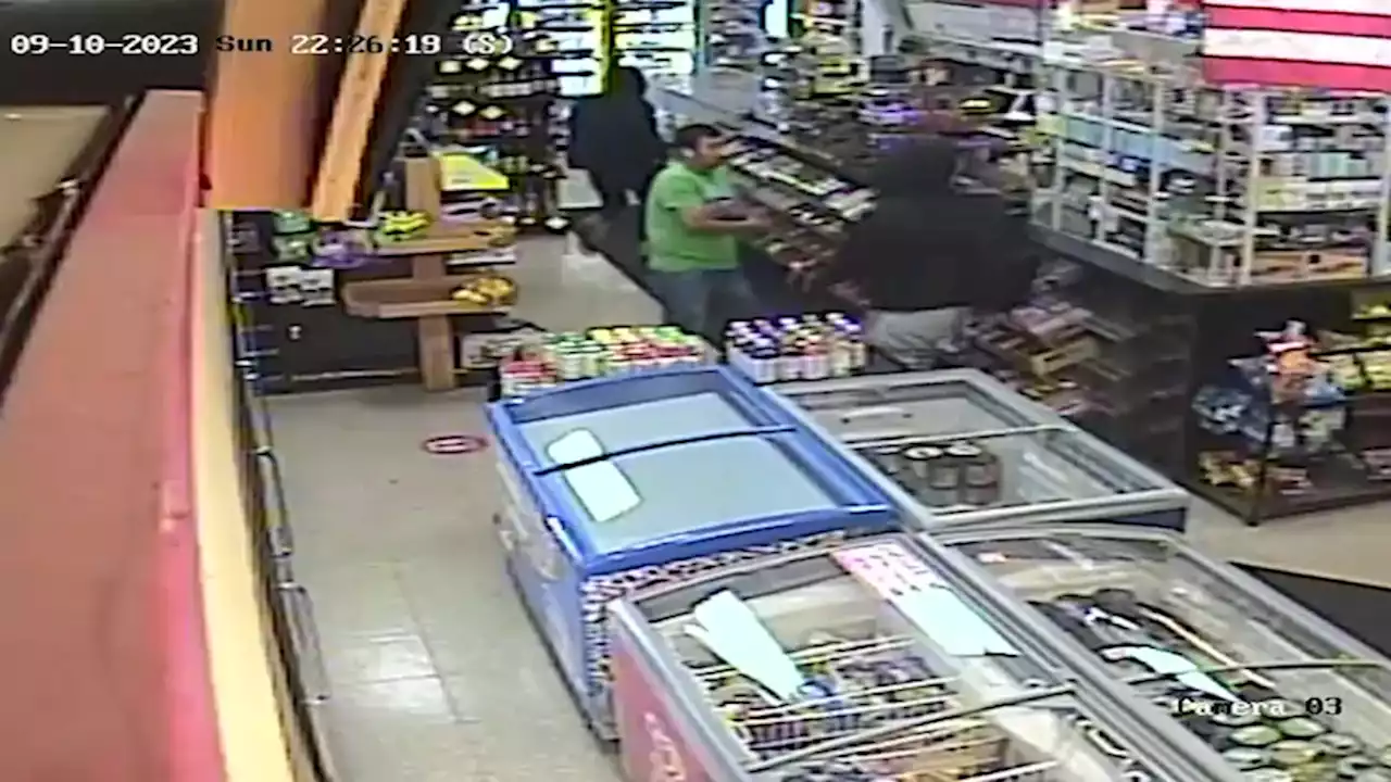 Surveillance video captures terrifying moments during armed robbery at West Town liquor store