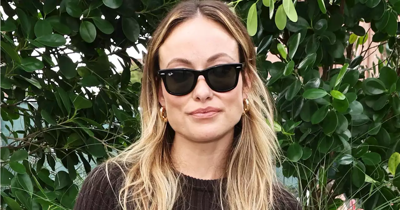 Olivia Wilde Fuses Summer With Autumn in Hot Pants and Knee-High Boots at NYFW