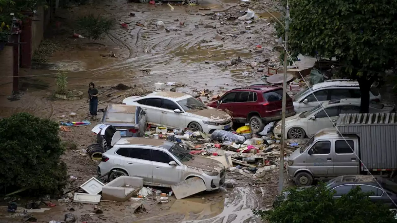 Unrelenting rain causes more than 100 landslides, traps residents in floodwaters in southern China