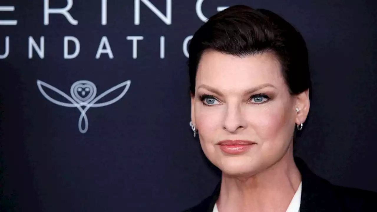 Linda Evangelista and son Augustin twin in matching suits at 2nd Annual Caring for Women Dinner