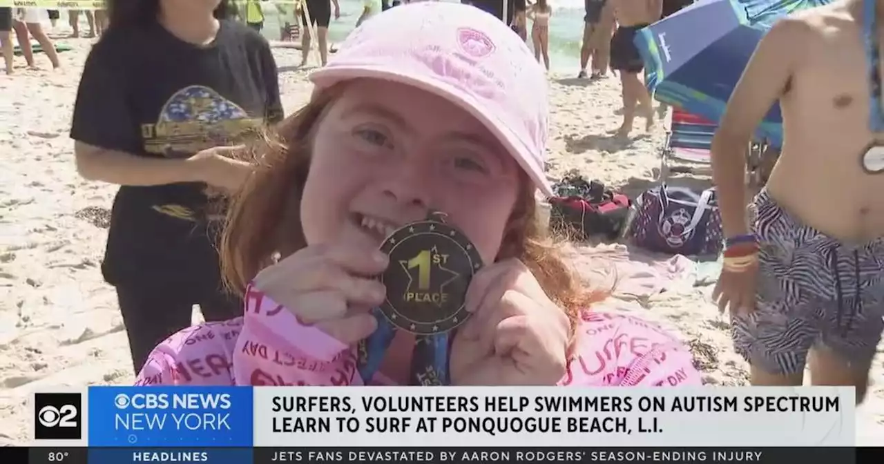 Surfers, volunteers help swimmers on autism spectrum learn to surf on Long Island