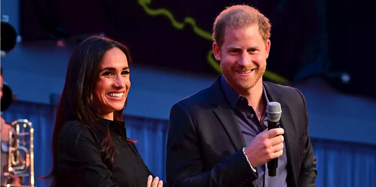 Duchess Meghan Is Lovely in a Little Black Dress While in Germany With Prince Harry