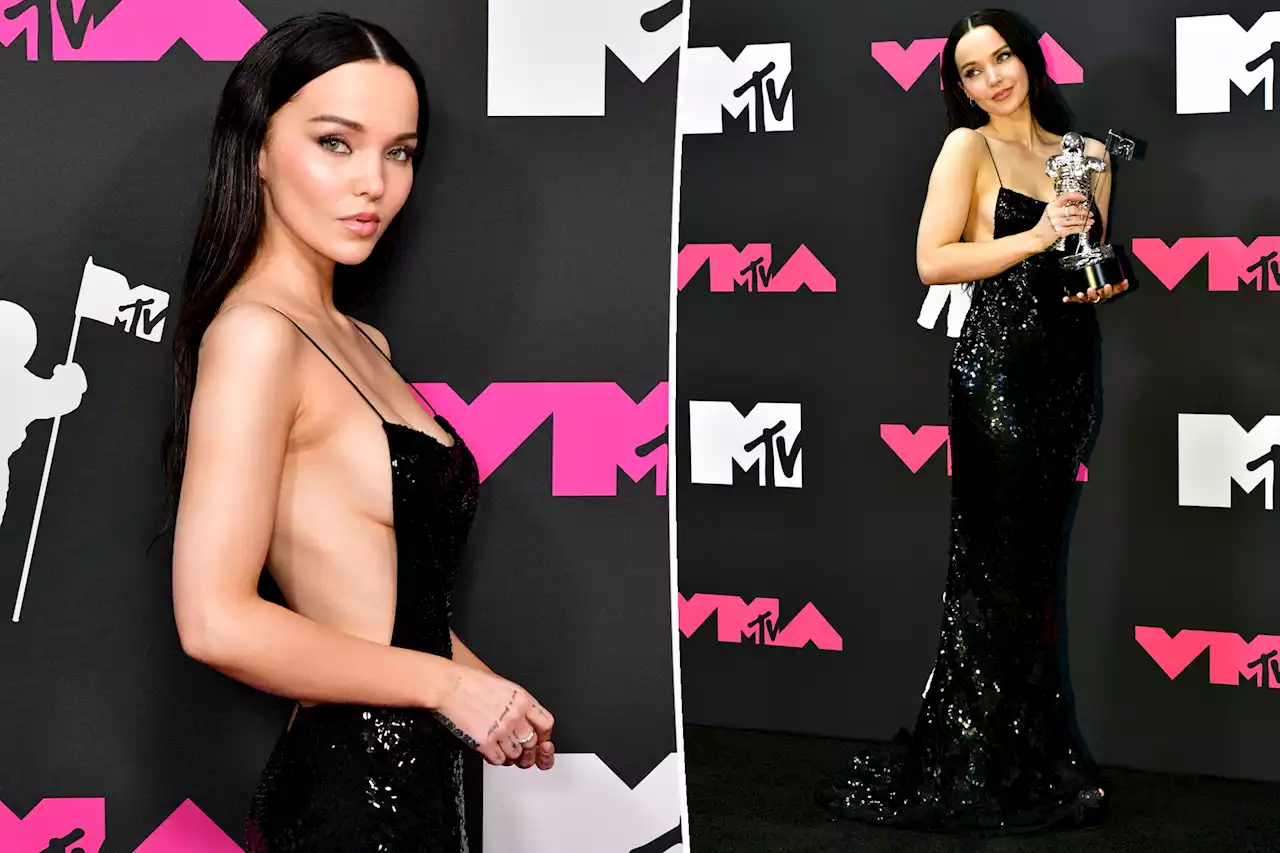 Dove Cameron flashes side boob in glittering black gown at the VMAs 2023