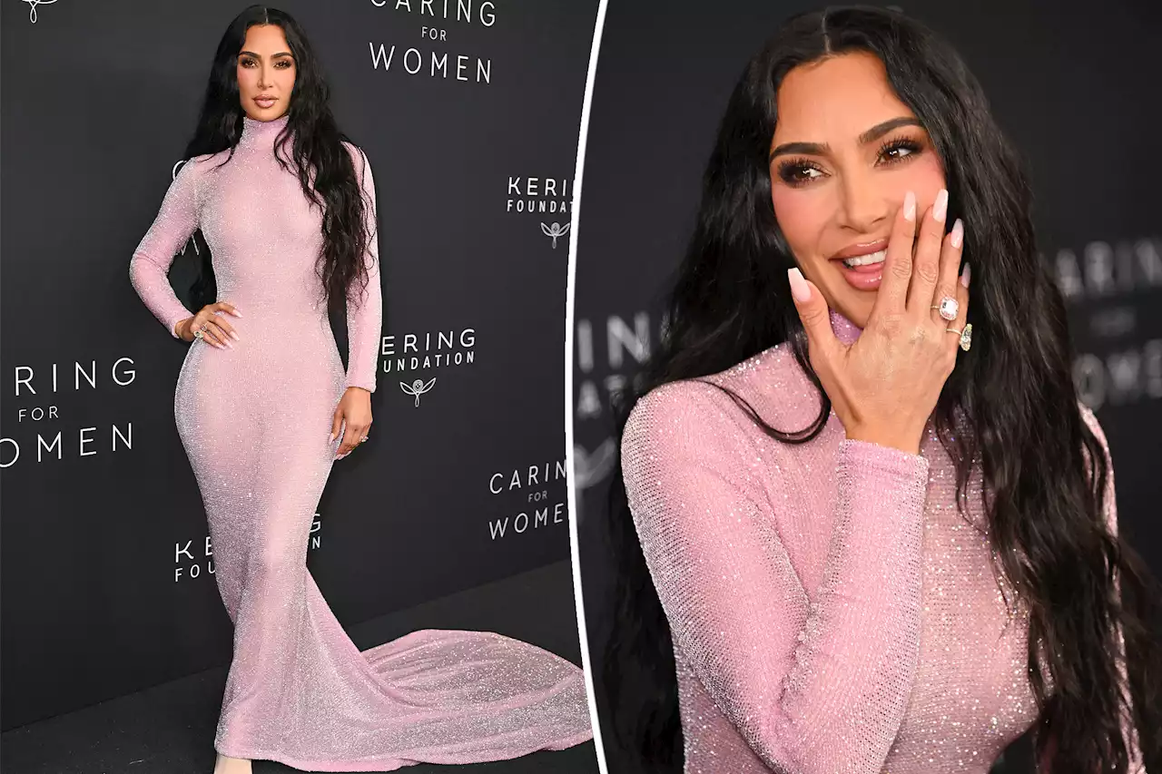 Kim Kardashian keeps ‘future alien Barbie’ vibe going in sparkling pink gown