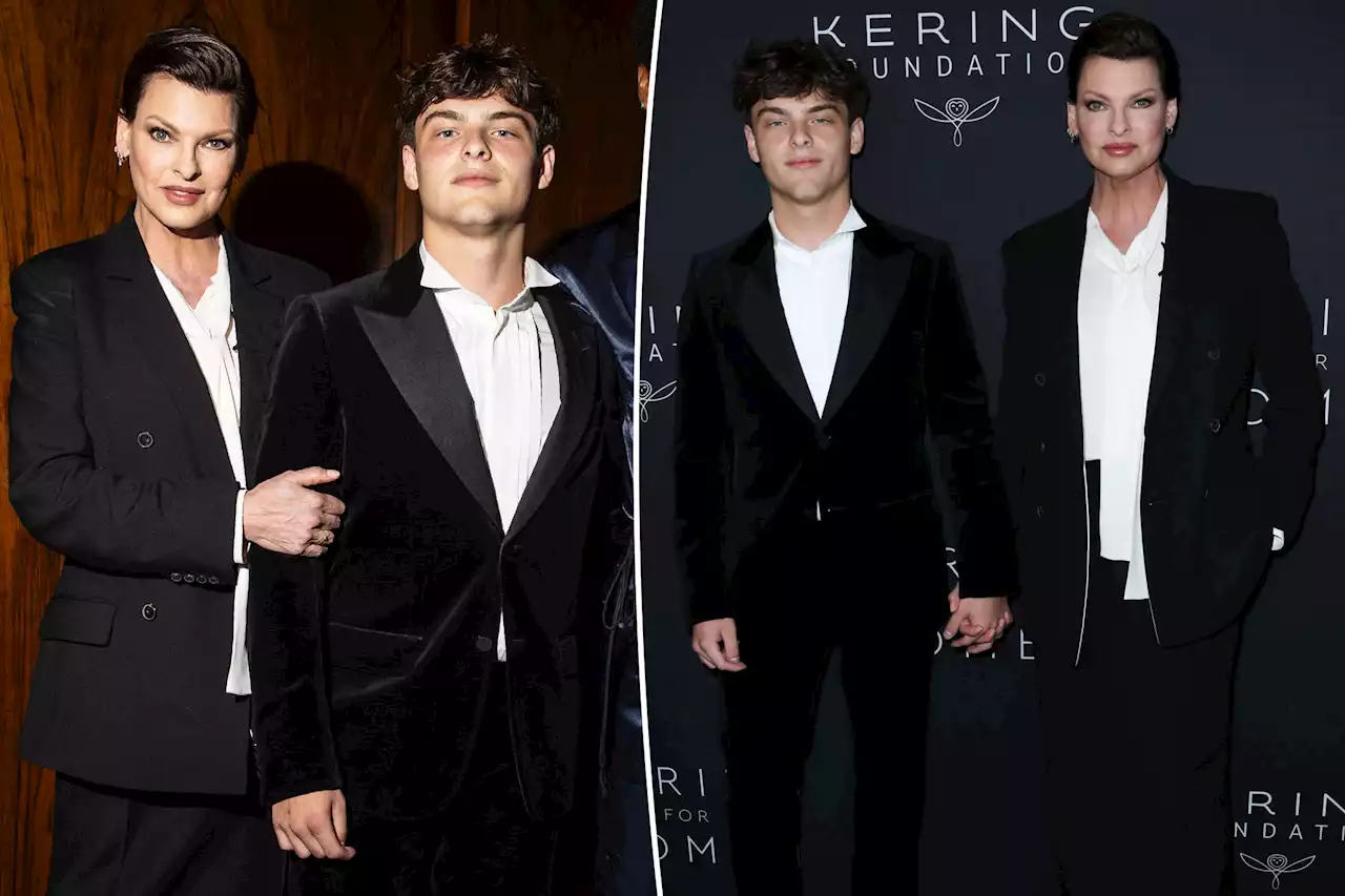 Linda Evangelista twins with 16-year-old son Augustin in suits for charity event