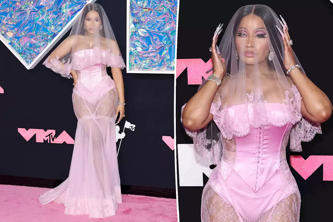 Nicki Minaj wears bridal corset and lace veil on the VMAs 2023 red carpet