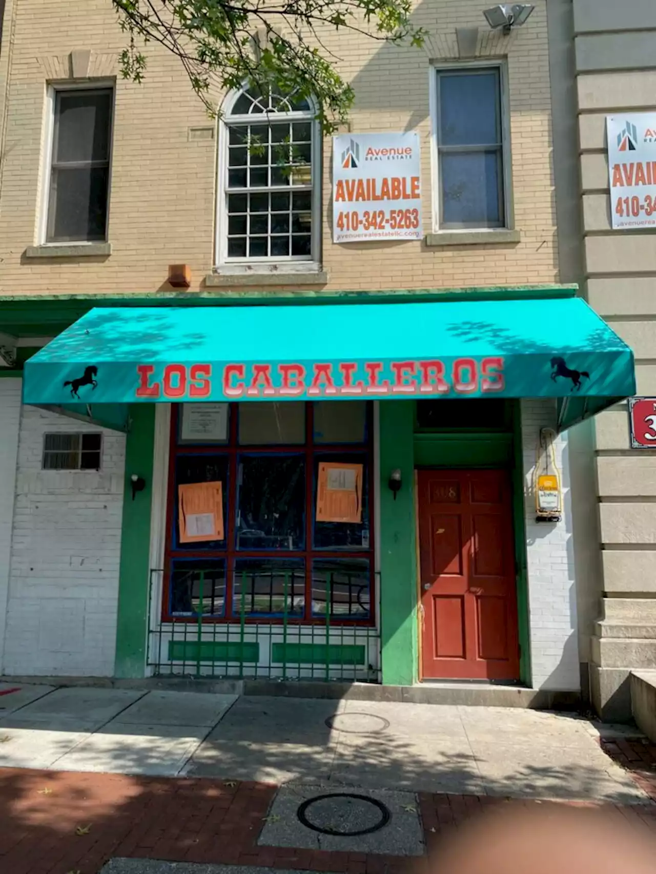 Los Caballeros signage up in Capitol Hill