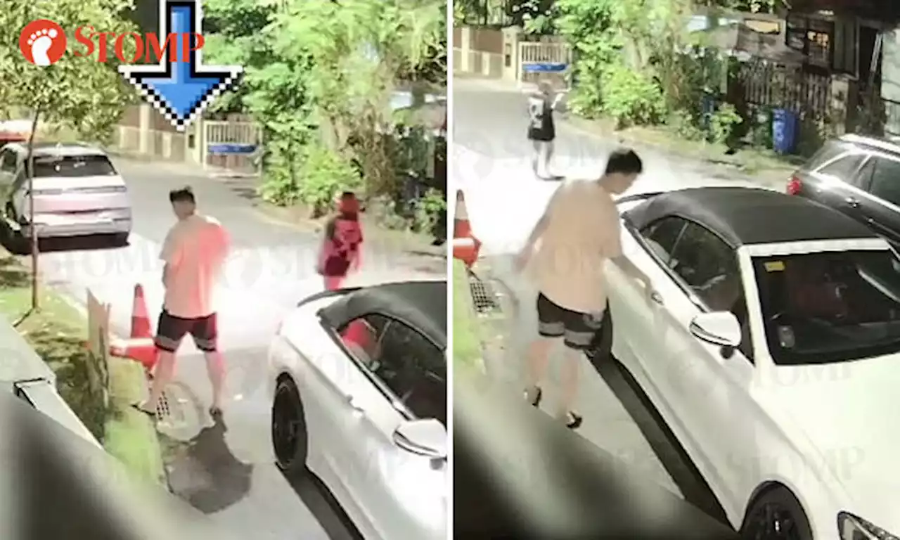 Driver parks car outside Siglap home, urinates by roadside and then walks away with woman