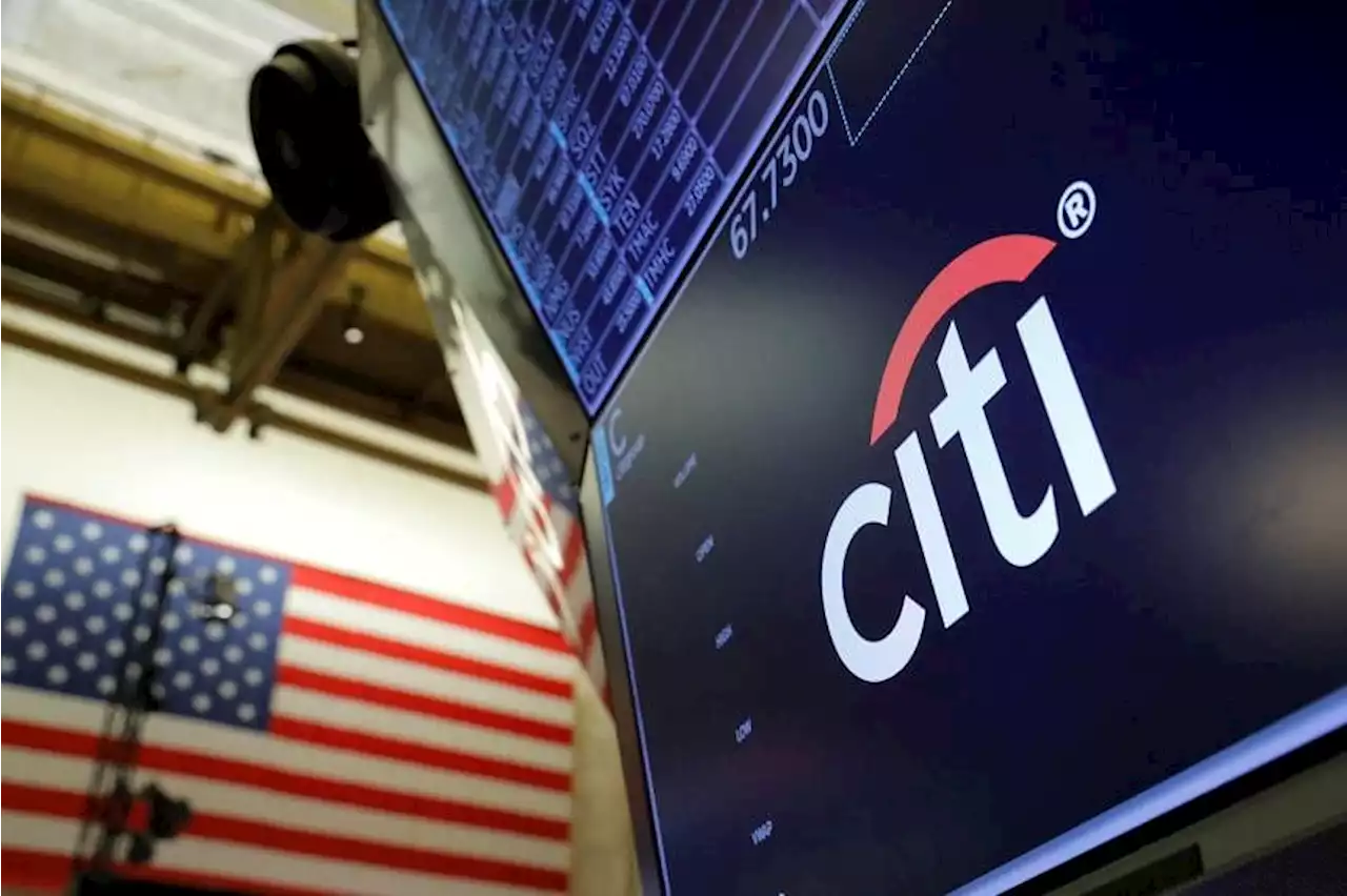 Citigroup plans job cuts as it revamps top management structure