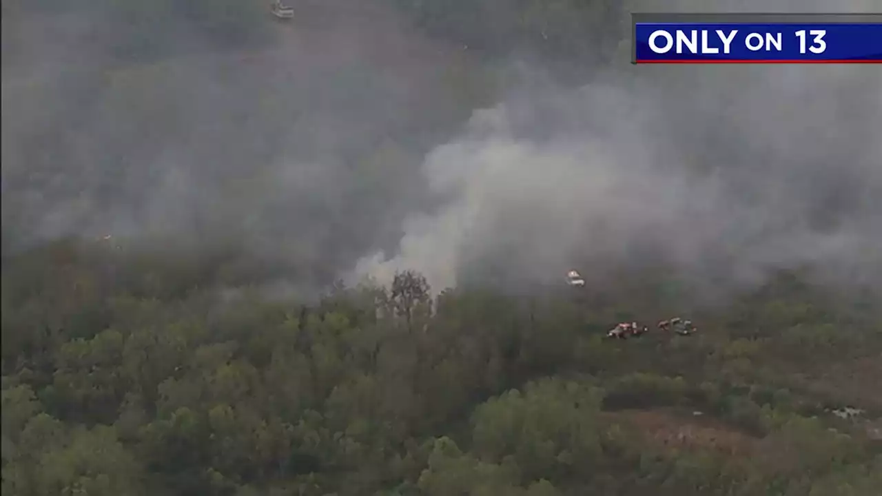 Firefighters working to put out large brush fire in Missouri City, Fort Bend County officials say