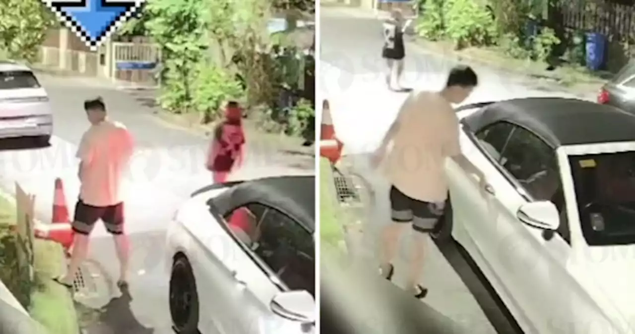 The drain's not a toilet: Driver parks car outside Siglap home, brazenly urinates on road