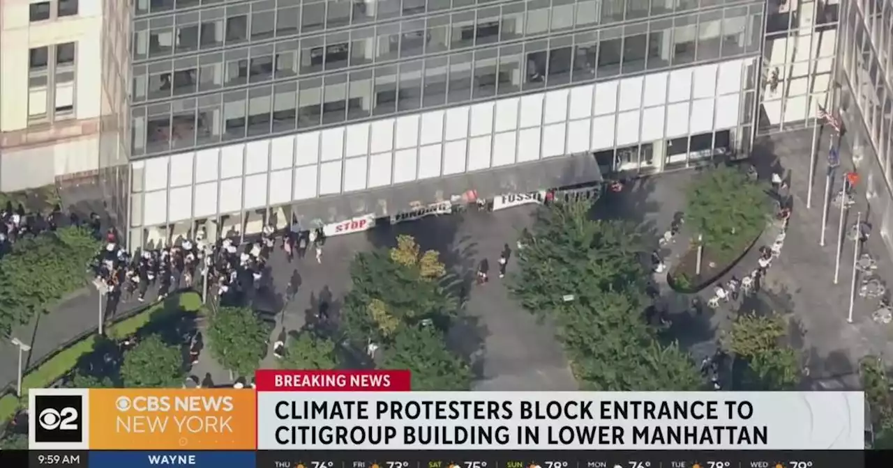 Climate change protesters block entrance to Citigroup building