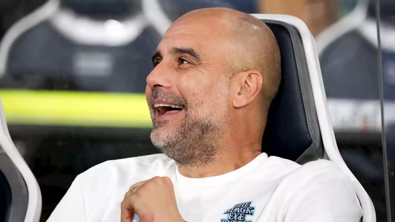 He's back! Pep Guardiola returns to Man City after recuperating from emergency operation on 'severe back pain' in Barcelona