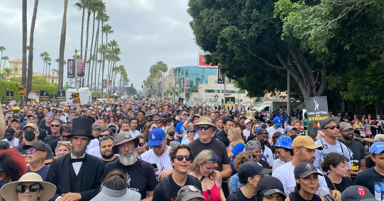 Thousands Of Striking Actors And Writers March In Hollywood