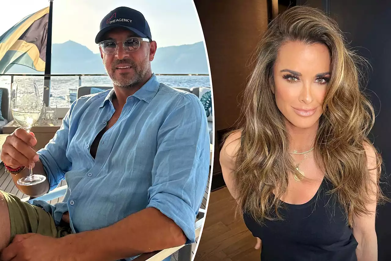 Mauricio Umansky says he and Kyle Richards are ‘both happy’ as they ‘work through’ their troubled marriage