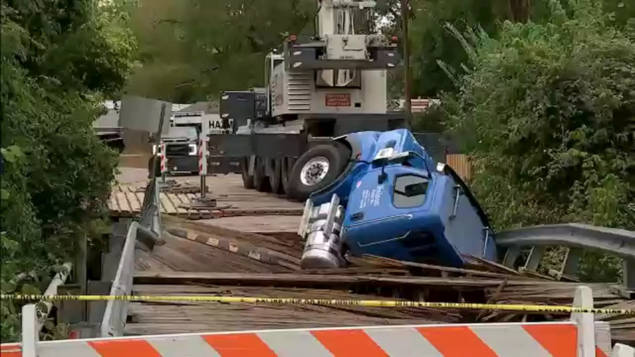 Loaded concrete truck falls through Montgomery County bridge with 4-ton weight limit