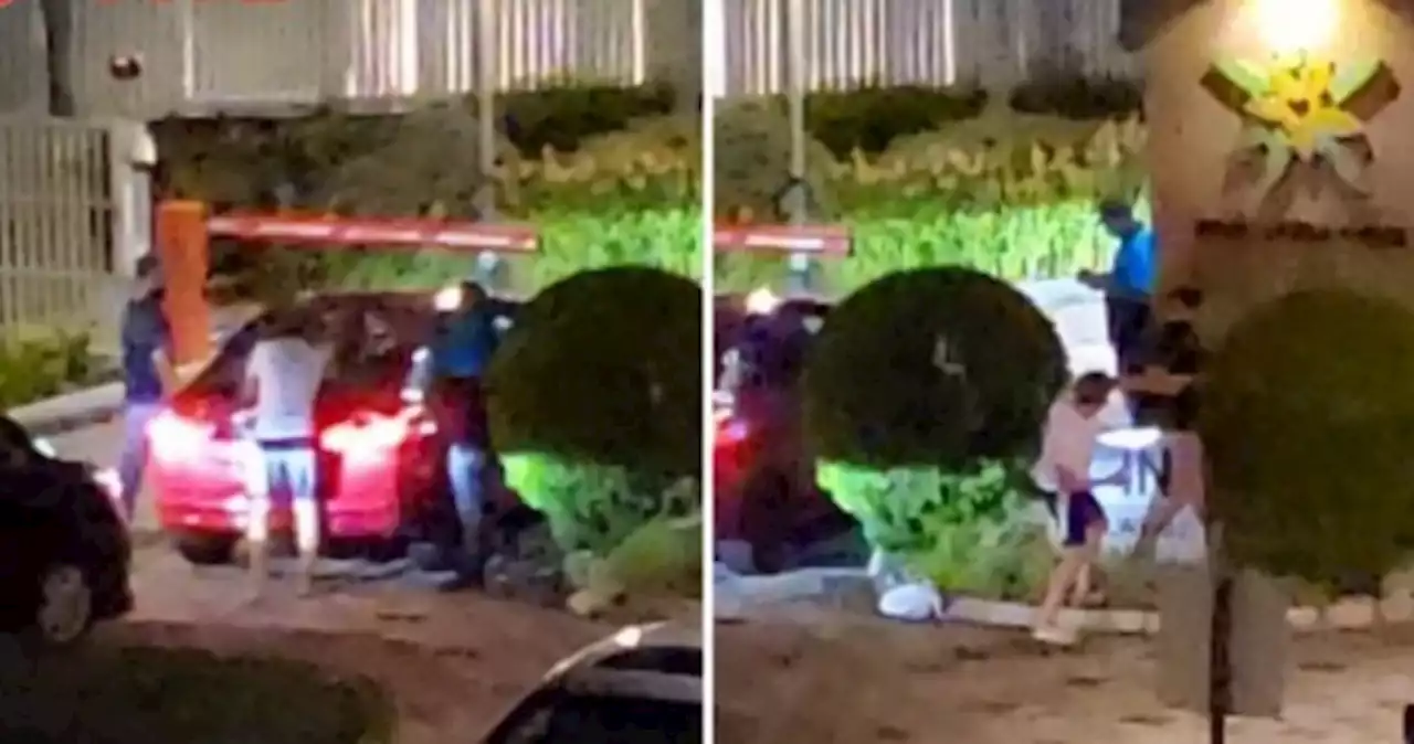 'Security guards were trying to break up the ruckus': 2 men fighting at condo entrance arrested for affray