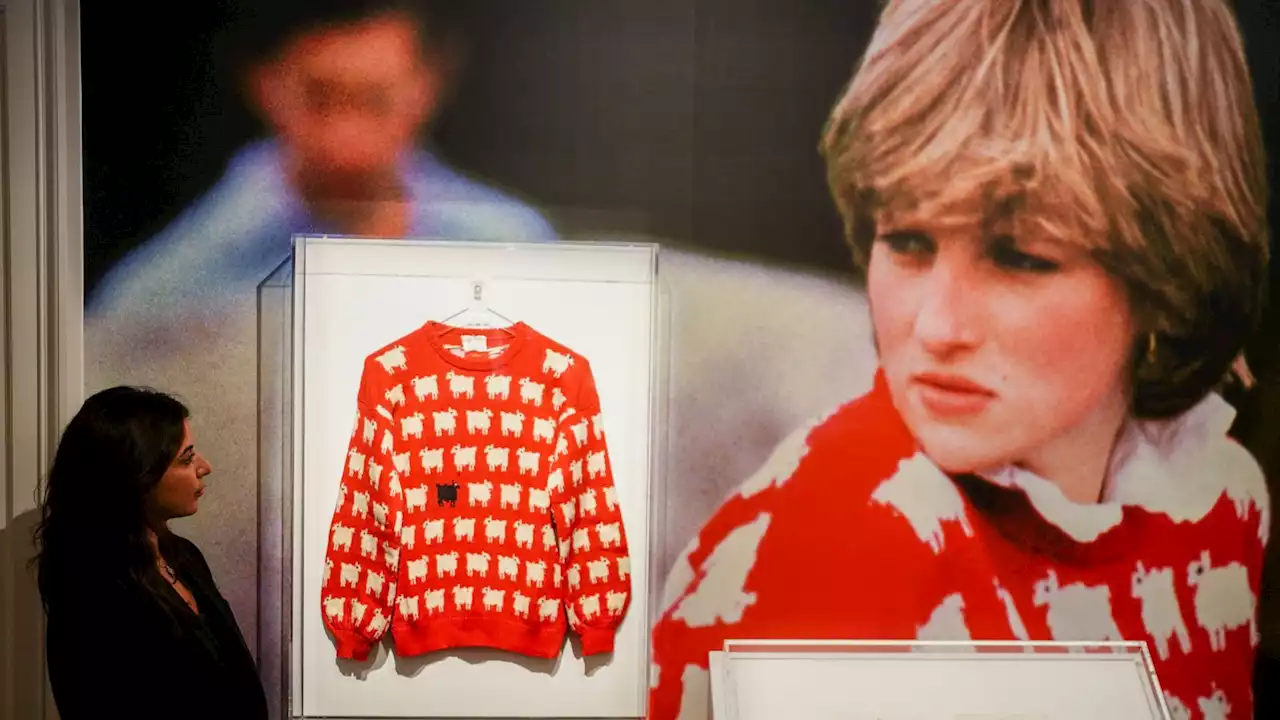 Princess Diana's iconic black sheep jumper fetches nearly £1m at auction