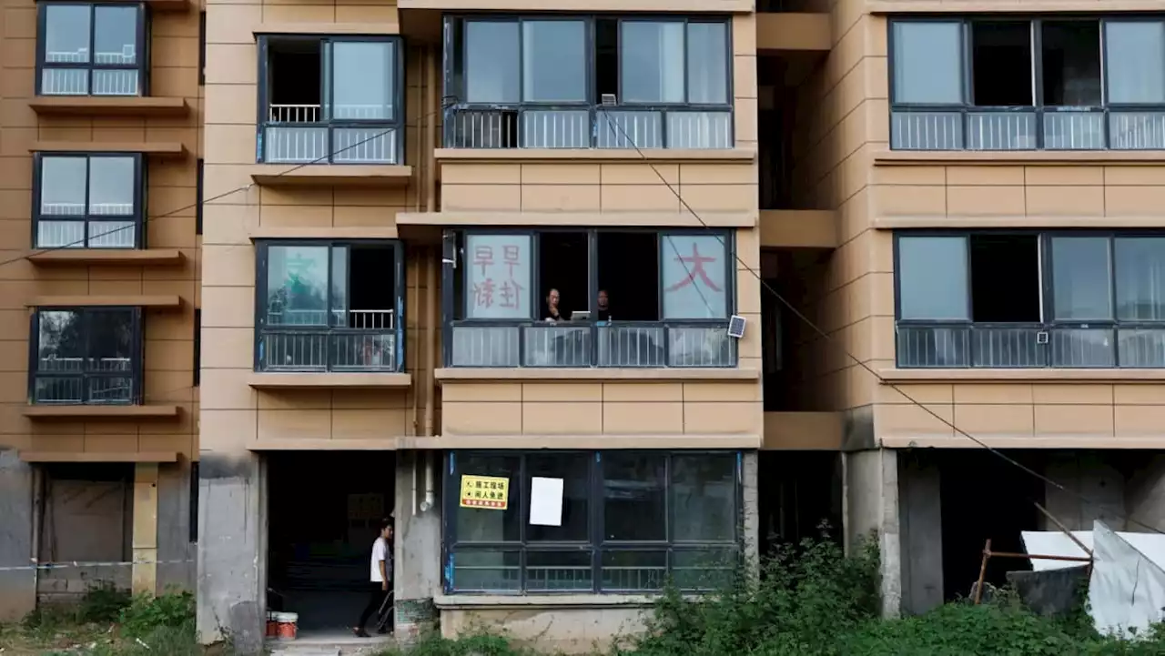 Broken dreams, shattered families in China's unfinished apartments