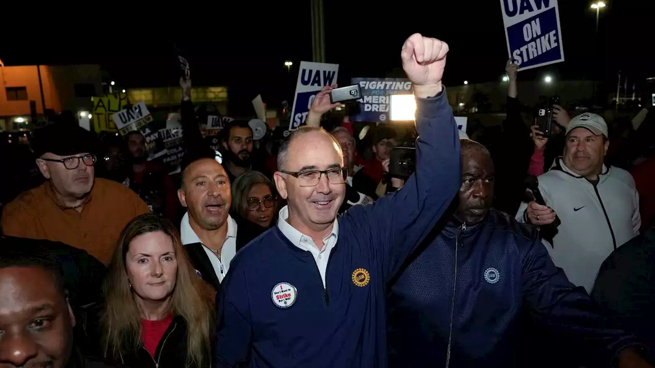 About 13,000 workers go on strike seeking better wages and benefits from Detroit’s three automakers