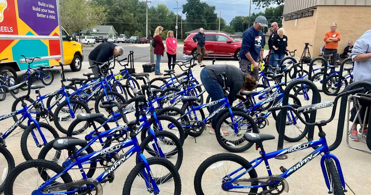 Arvada second graders surprised with bikes in honor of fallen Officer Gordon Beesley