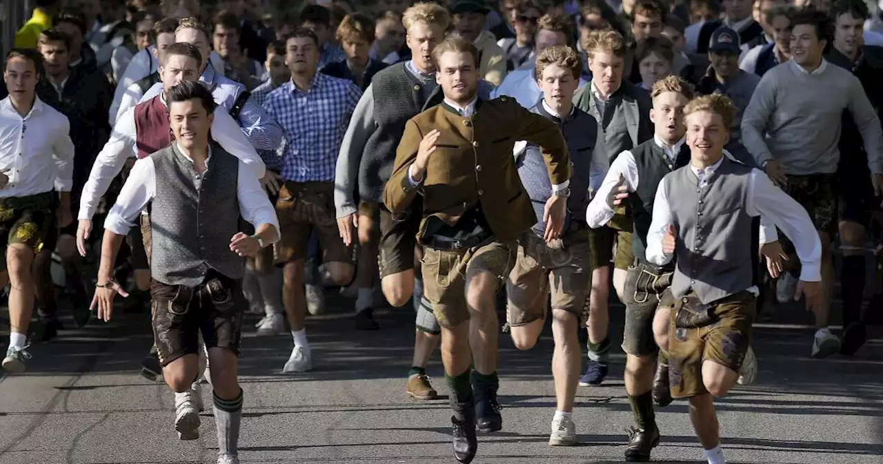 Beer flows and crowds descend on Munich for the official start of Oktoberfest