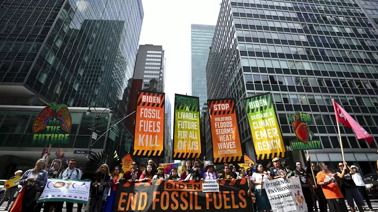 Thousands march to kick off climate summit, demanding an end to warming-causing fossil fuels