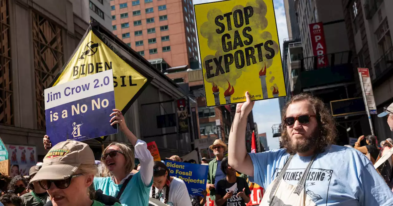 Tens of thousands march to demand end to fossil fuels ahead of U.N. climate summit