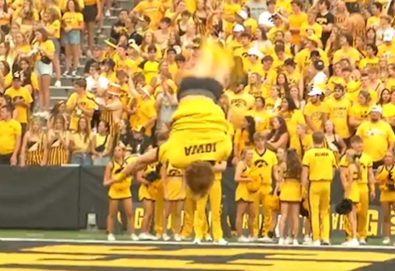 Iowa cheerleader’s pants fall down during backflip, but he still stuck the landing