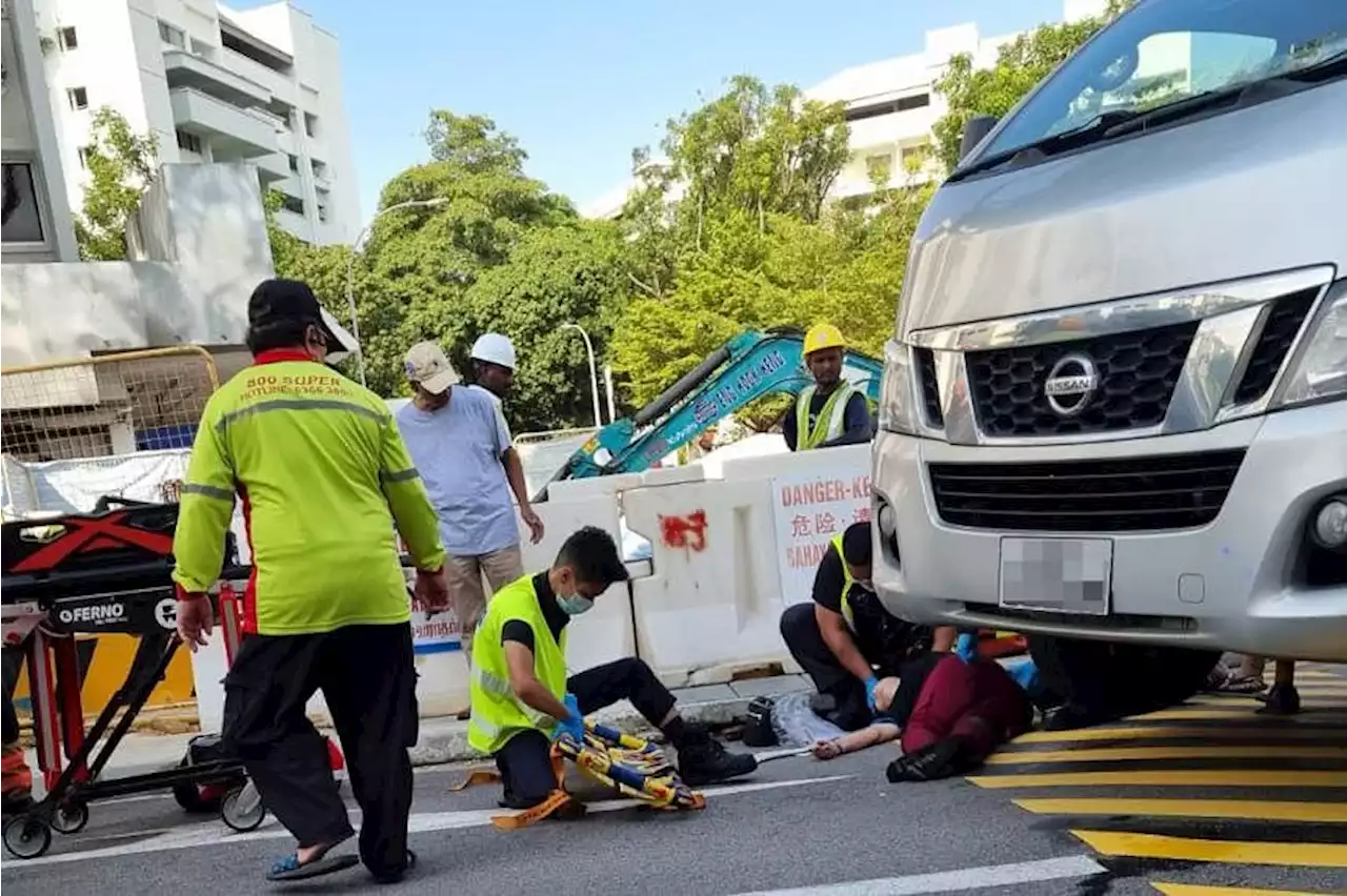 60-year-old woman’s legs pinned under van in Tampines road accident