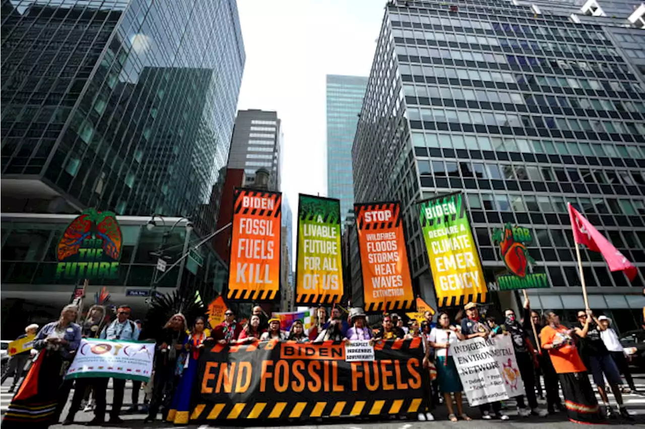 Thousands march to kick off climate summit, demanding an end to warming-causing fossil fuels