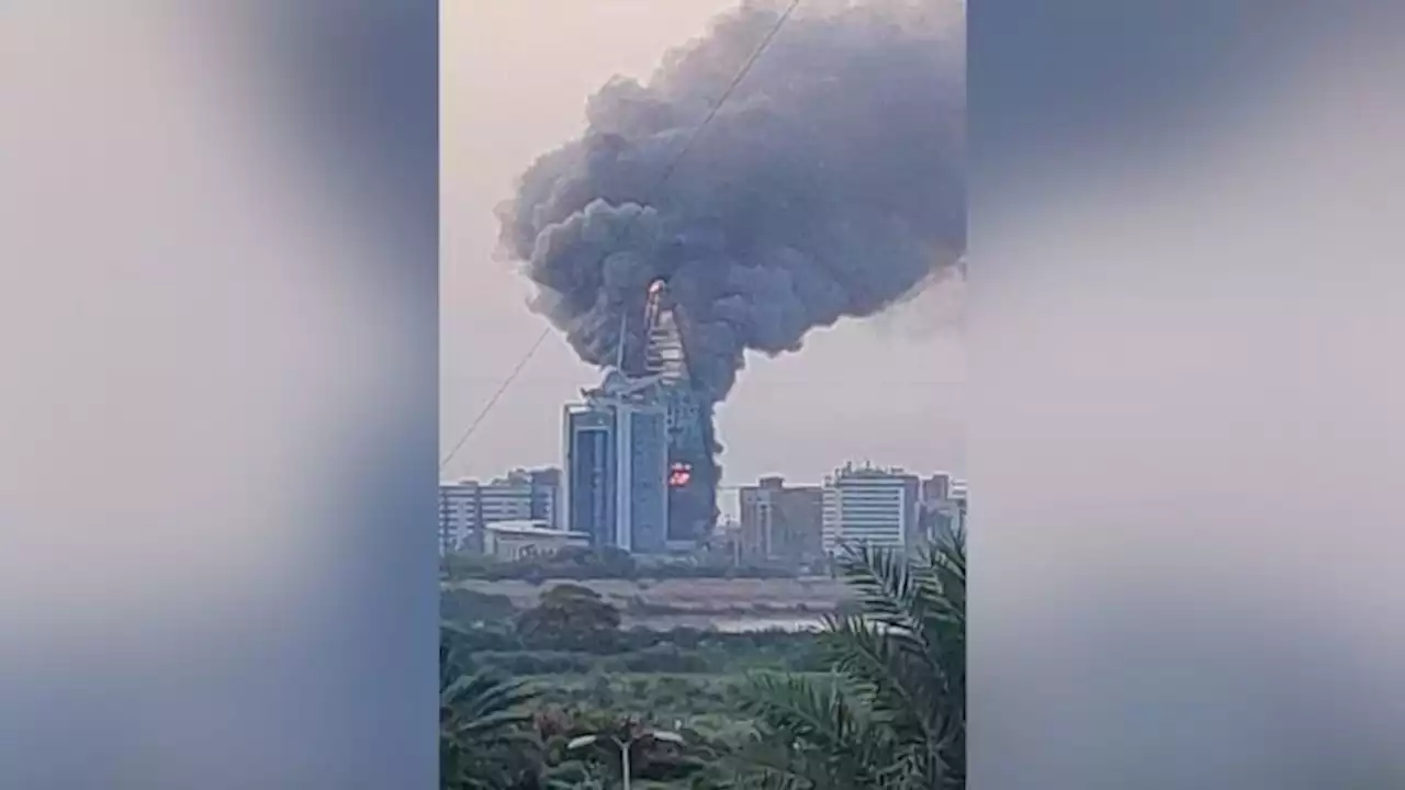 Landmark buildings ablaze in Khartoum as Sudan fighting erupts