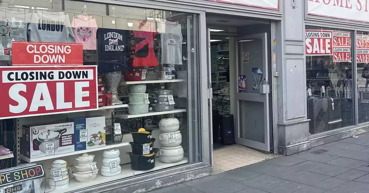 Sign announces closure of city centre shop