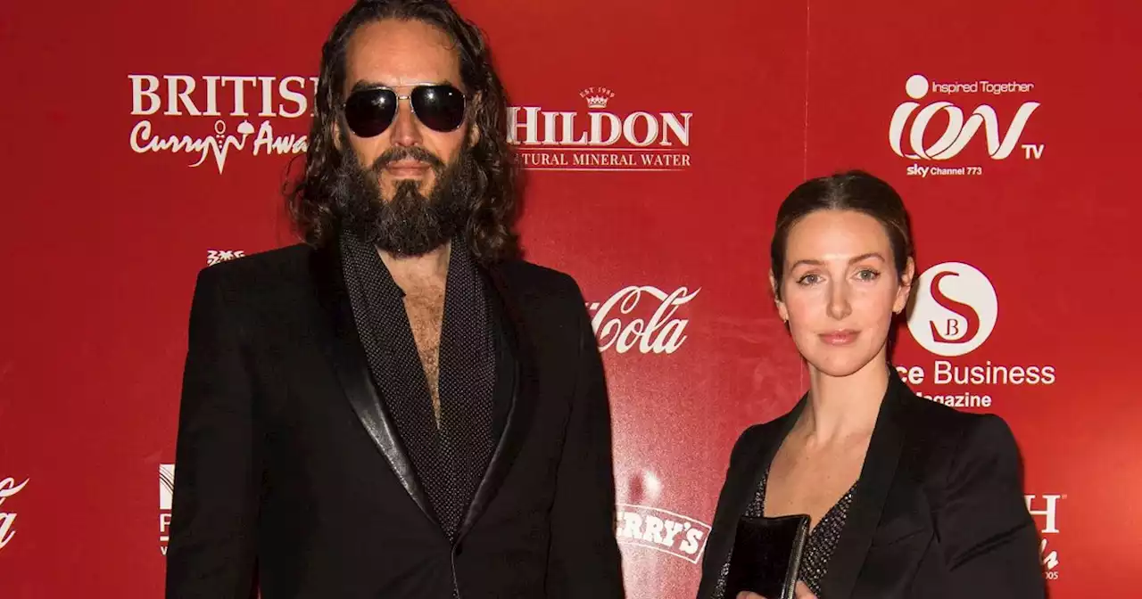 Russell Brand's wife 'standing by' accused star following rape allegations