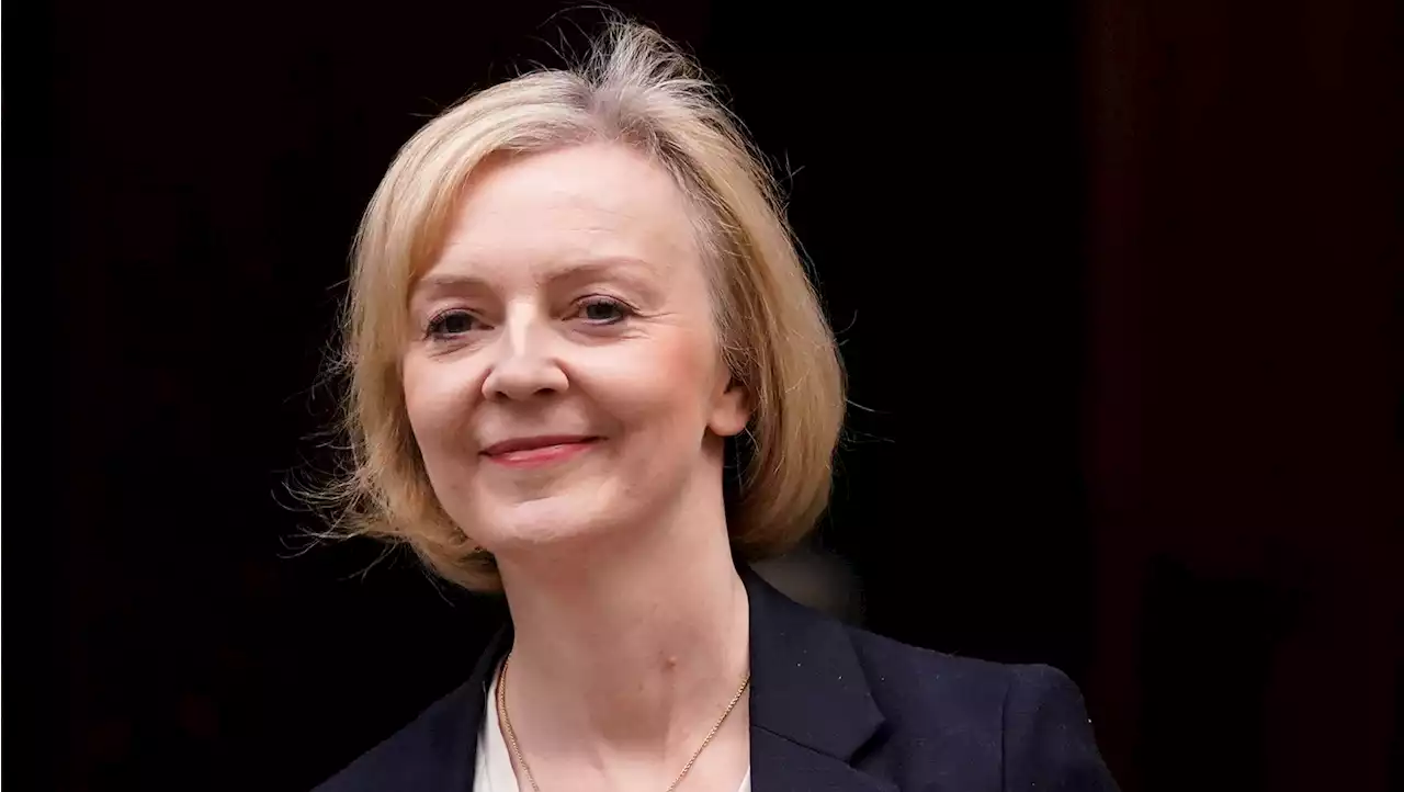 Truss challenges Sunak to cut taxes and delay net zero target as she defends her mini-budget