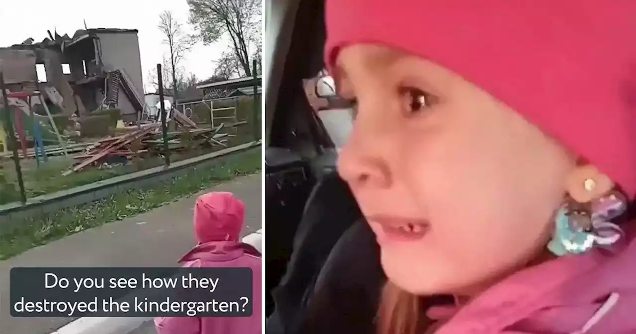 Tears etched on little girl's face after seeing her nursery has been bombed